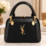Elegant Black Textured Handbag with Gold Hardware